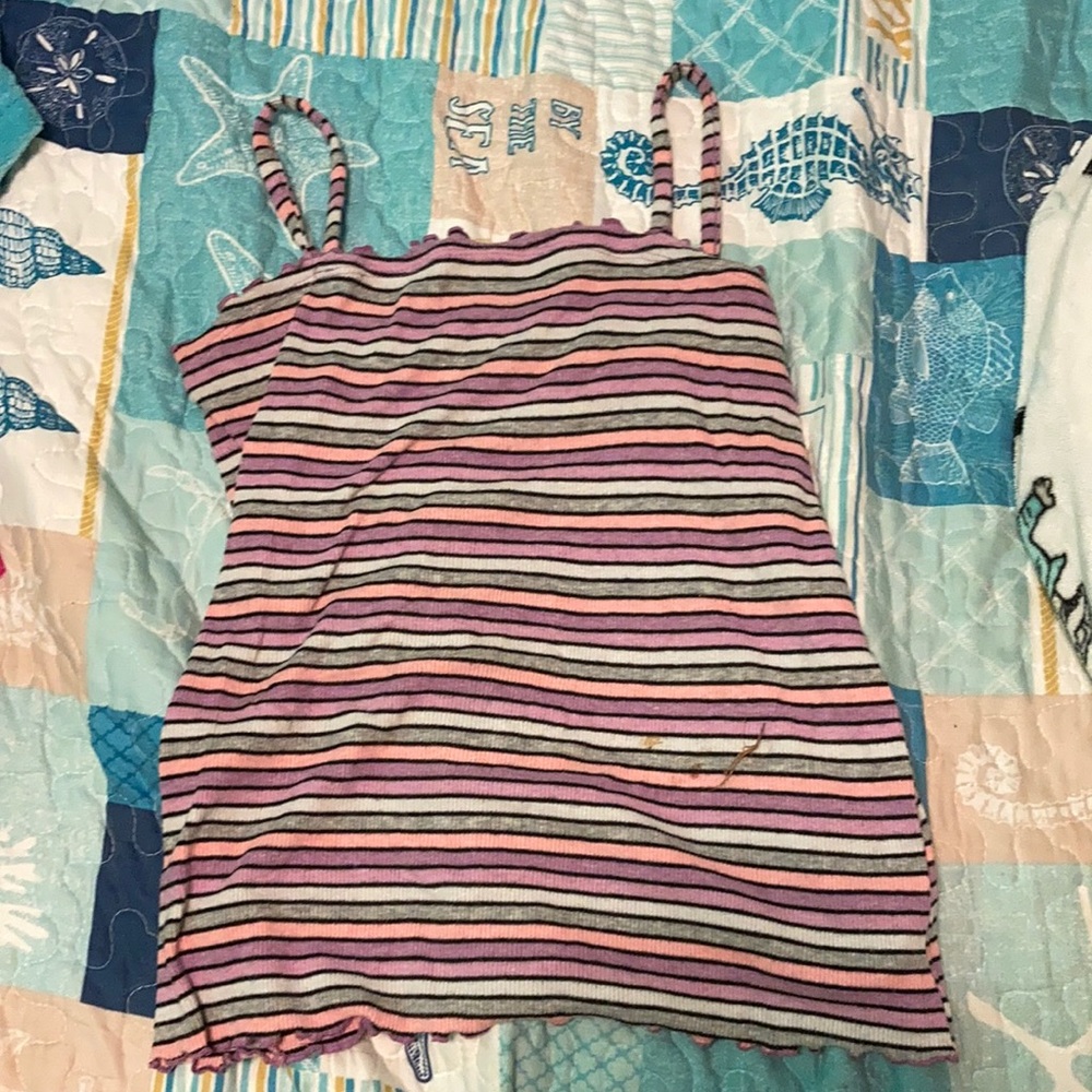 Very nice shirt ruffles at the top and bottom
